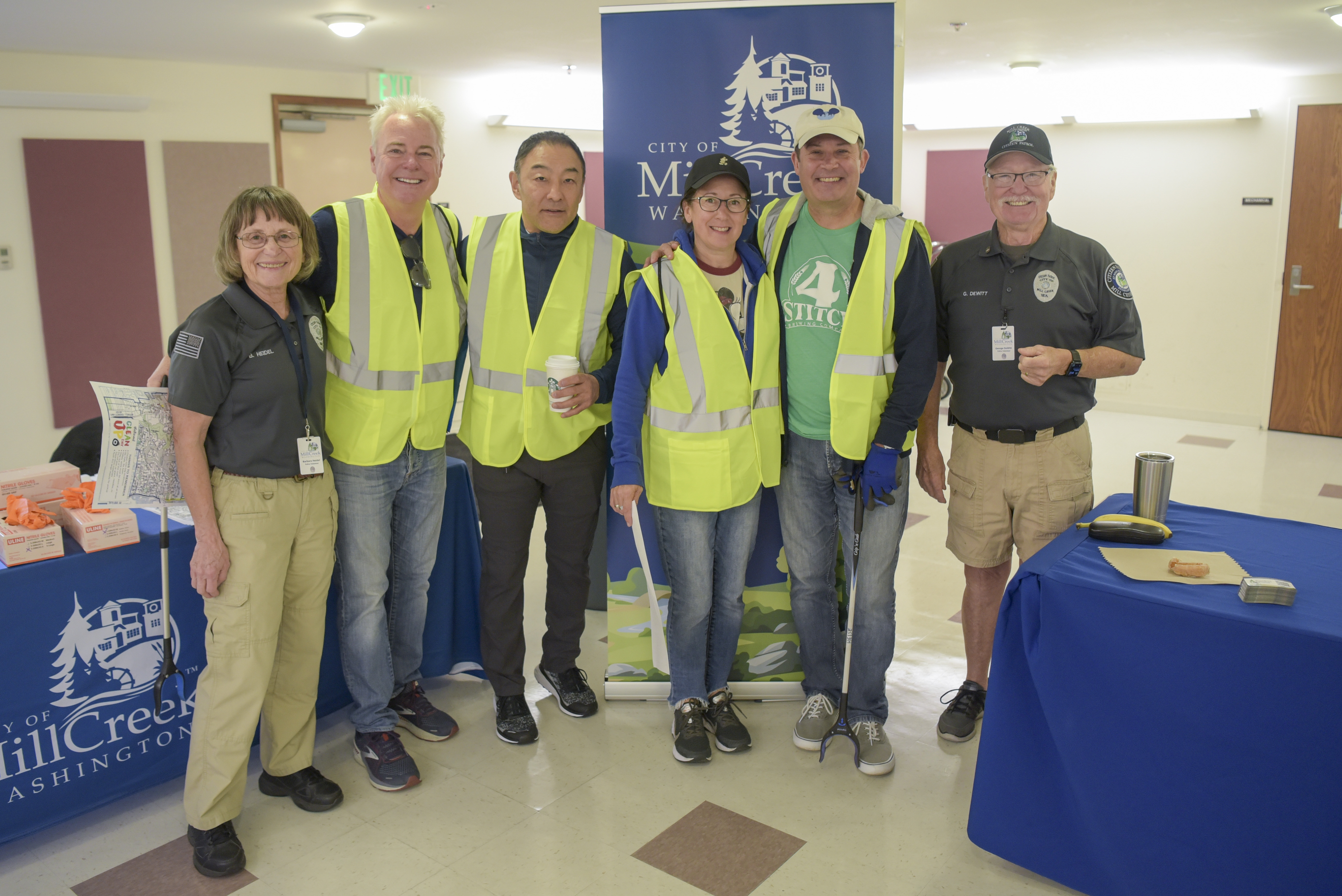 Volunteers prepare to clean up the North Creek Trail for National Trails Day