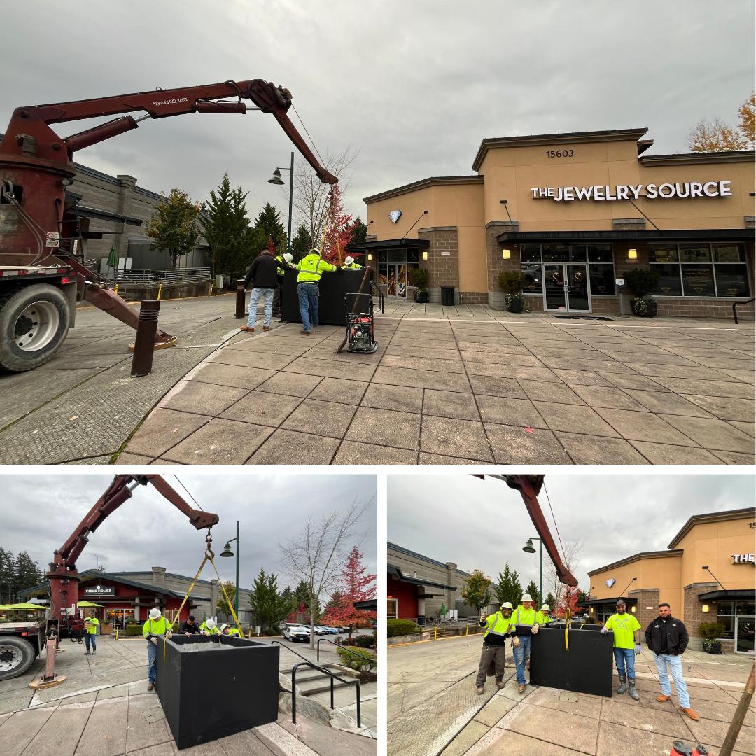 Public Works Crew installing the new Tree Lighting Ceremony box outside the Jewelry Source.