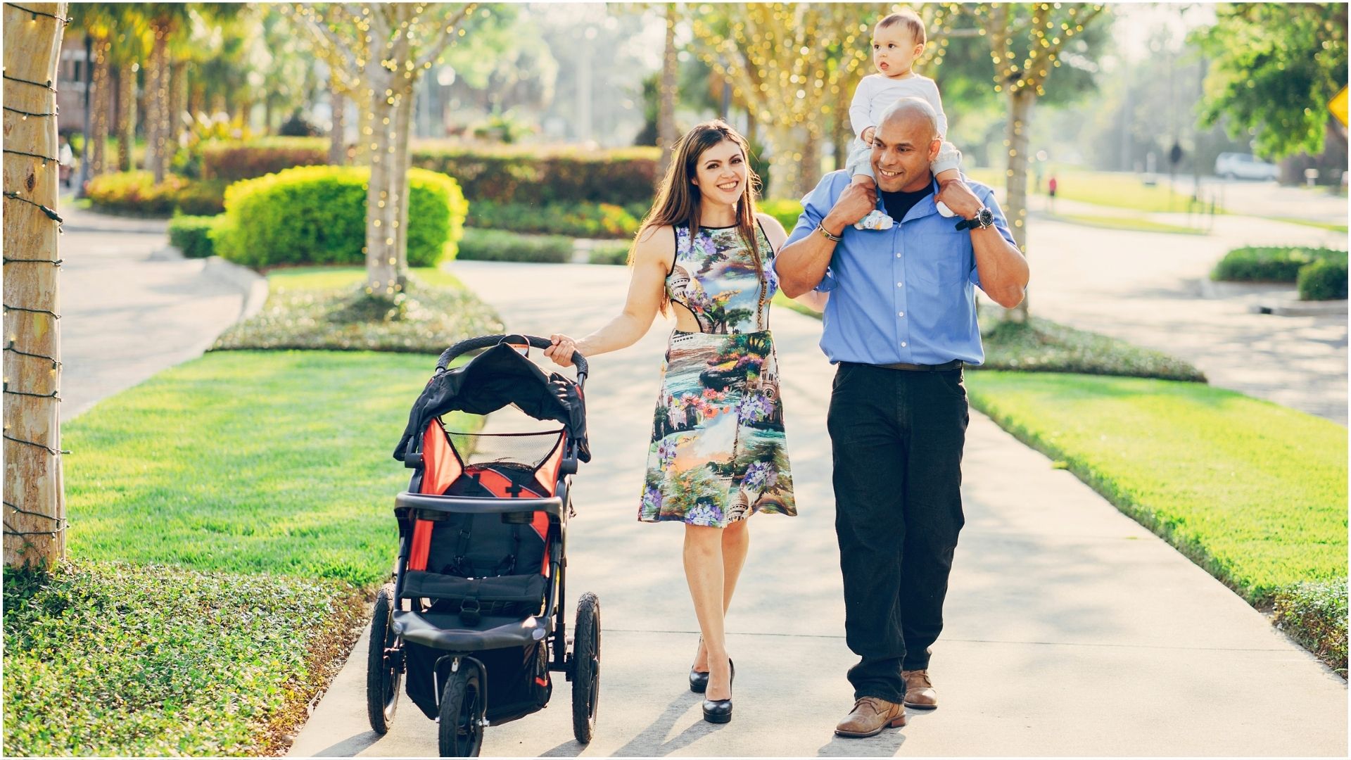 A family walking down the sidewalk
