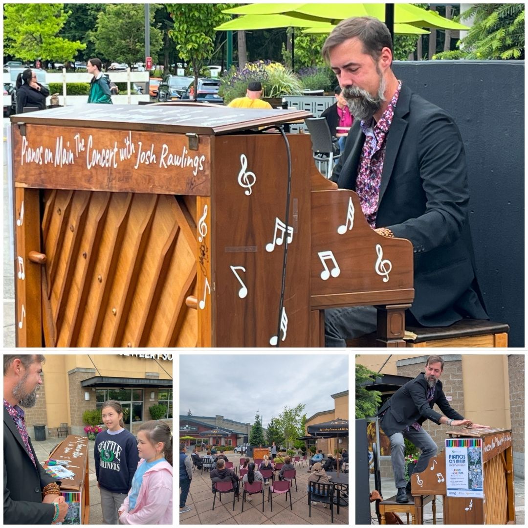 Josh Rawlings plays piano for a crowd on Main Street 