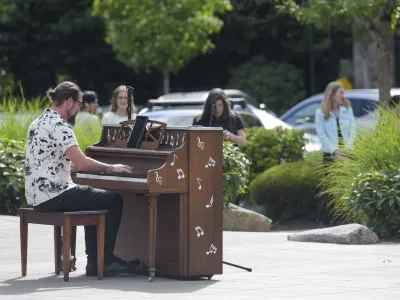 Pianist Josh Rawlings performs on Main Street